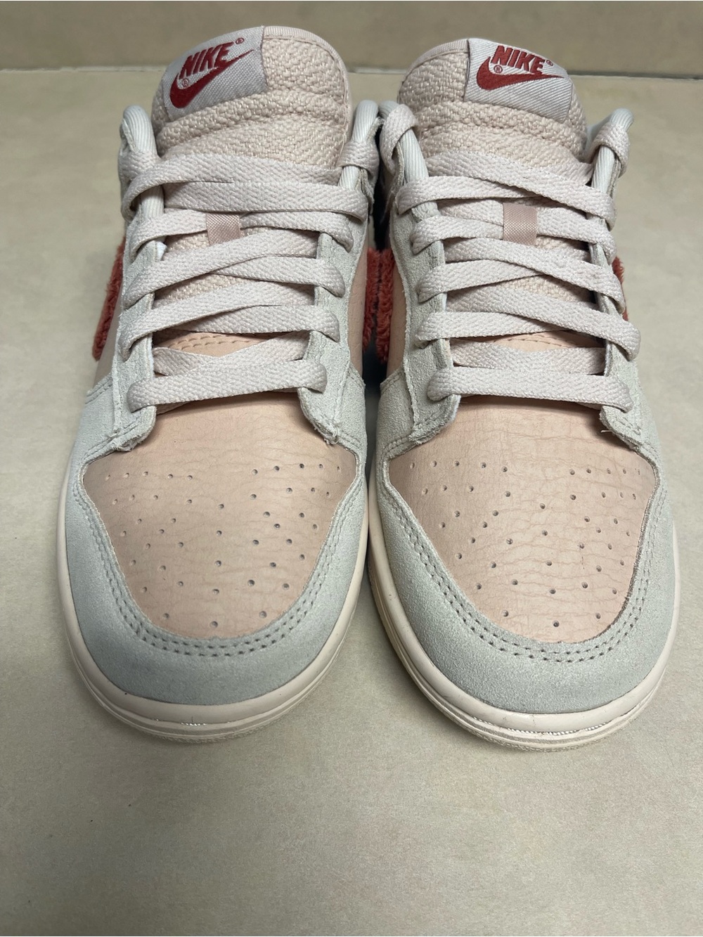 Nike Women's Dunk Low Terry Swoosh in Blush Pink and Cream with Red Logo